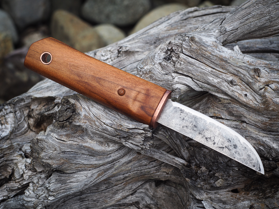 Island Blacksmith: Hand forged knives reclaimed from files and farm equipment.